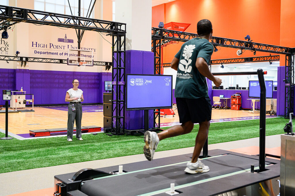 Pictured at left was Dr. Jamie Kronenberg, assistant professor of physical therapy, testing an individual’s running mechanics in the Human Biomechanics and Physiology Lab.