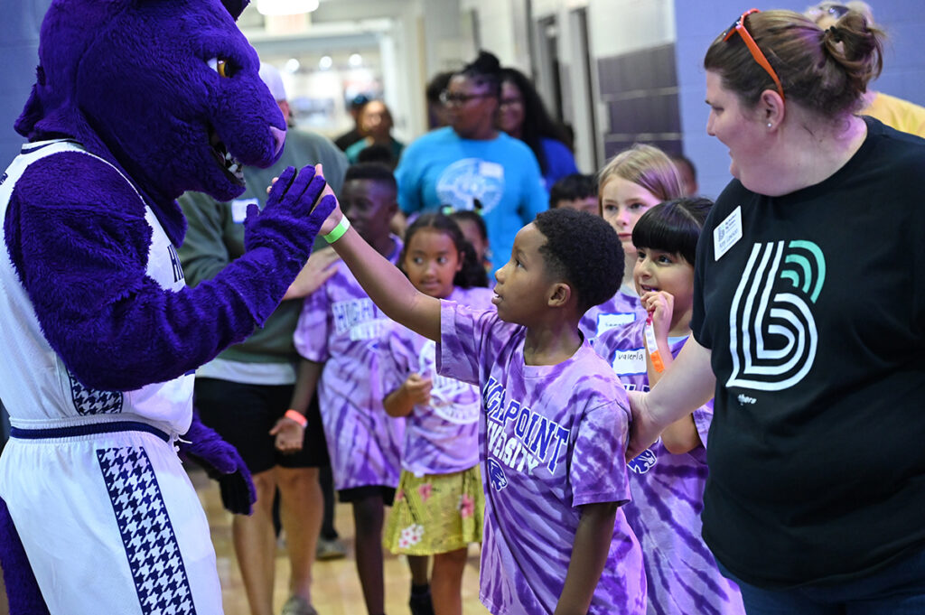 HPU’s purple panther mascot Prowler greeted children as they entered the Millis gymnasium.