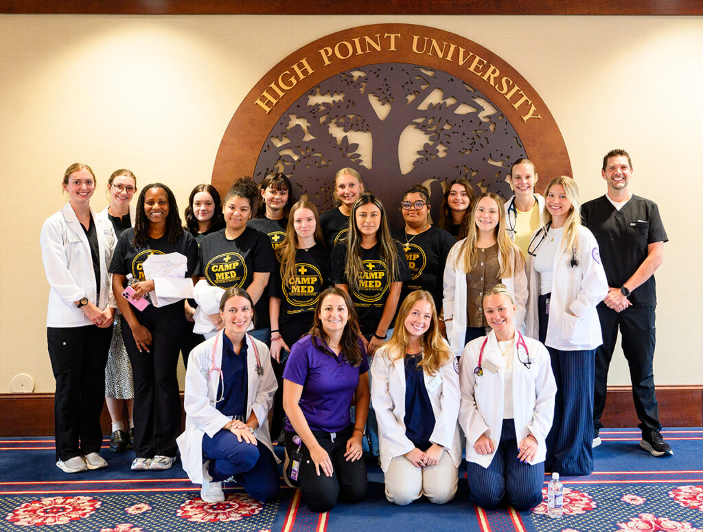 Pictured were PA students and faculty with high school students who visited HPU’s campus on July 14 as part of the Northwest Area Health Education Center’s CampMed summer program. PA student Rose Sink was pictured at left on the front row with Associate PA Professor Nathalie Ortiz Pate and PA students McKenna Roof and Alyssa Avallone. Pictured at right of the middle row were PA students Claire Roembke and Ana Haselden. On the back row from left were PA students Erin O'Donnell and Ashley Diehl with Caroline Huettner and Dr. Matthew Kesic at far right.