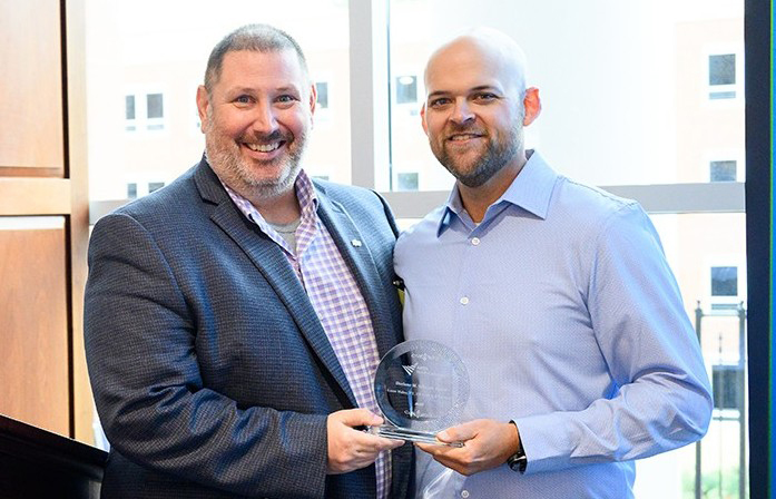 Dr. Lance M. Mabry, an assistant professor, received the Darlene M. Sekerak Legislative Award from Shultz during the annual APTA NC conference.