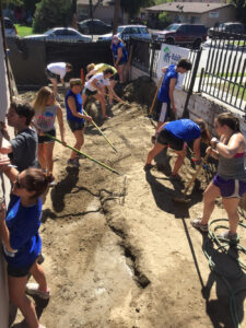 Students in Alpha Phi Omega, a co-ed service fraternity, volunteer for Habitat for Humanity in Los Angeles during spring break to perform construction work at the Euclid Street worksite.