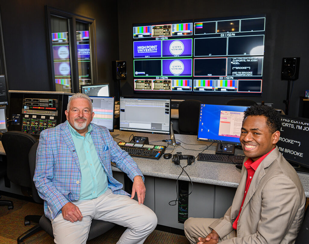 Bobby Hayes, chair of the HPU Department of Journalism and Sports Media, in the studio with Wendell Epps, right..