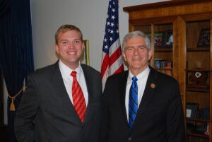 Adams with U.S. Rep. Daniel Webster.