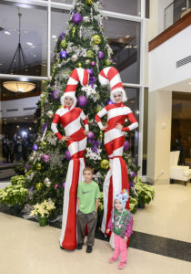 Community Christmas - candy cane stilts 1