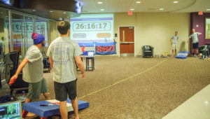 Students Ryan Fox, Eric Donovan, Liam Barger and Carter Hering break the Guinness World Record for the longest marathon of cornhole.