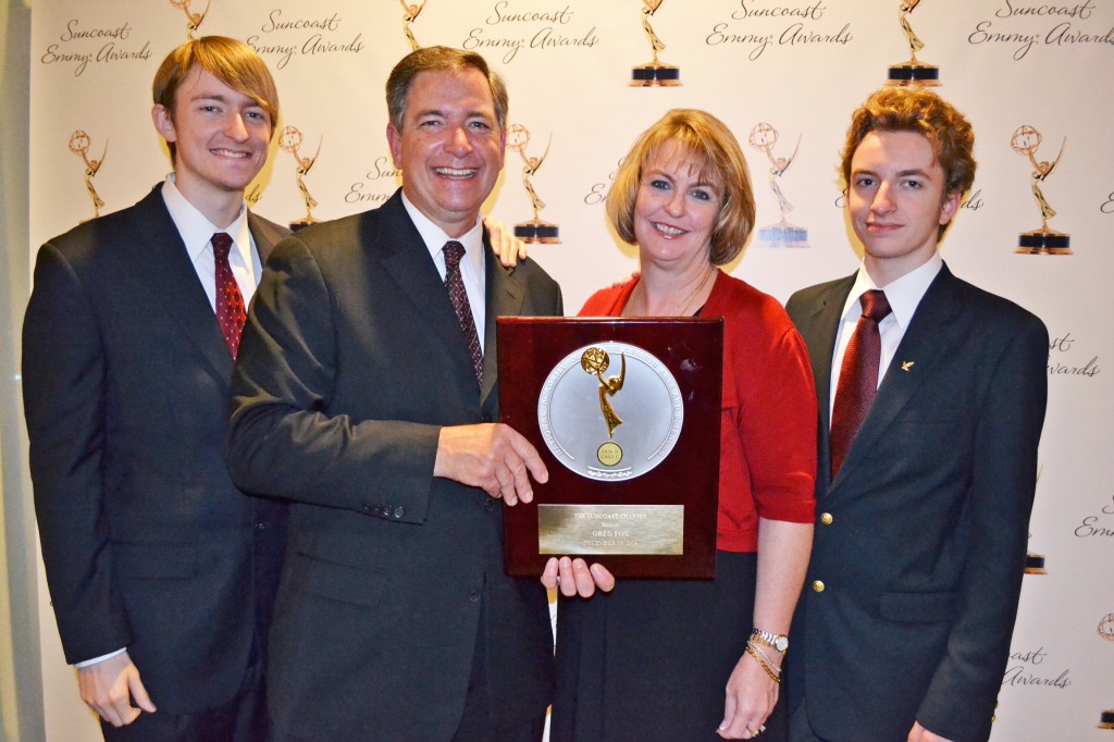 Greg Fox (second from left) stands with son Ryan Fox (left), wife Mary Ann and son Colin Fox at the 38th Annual Suncoast Emmy Award ceremony. Missing from photo: son Kevin Fox.