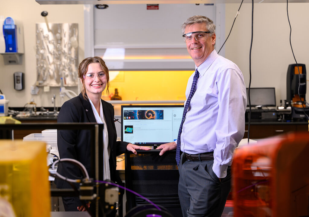 Sadie Flagg, left, is pictured in a laboratory with her mentor Professor Brian Augustine, interim dean of the Wanek School of Natural Sciences.