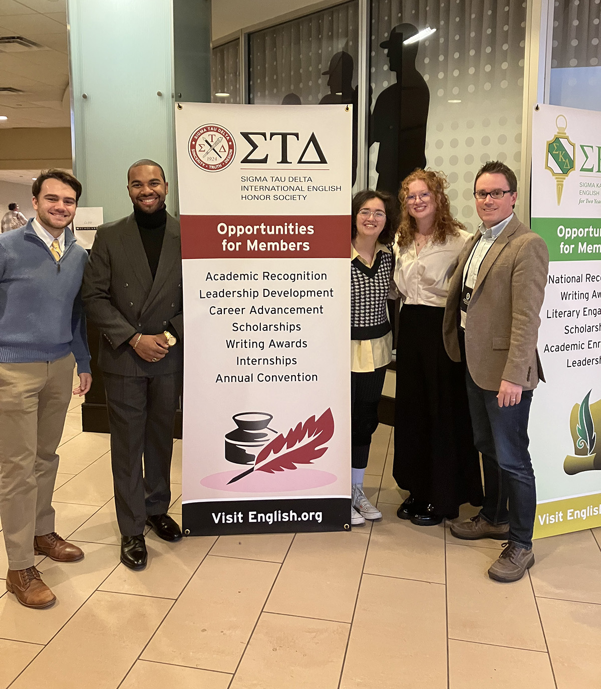 Four English majors traveled to St. Louis, Missouri, to give presentations at the annual convention of Sigma Tau Delta, the international English honor society. Pictured from left are HPU senior English majors Max Kresock, Jowan Williams, Julianne Kendrick and junior Taylor Galavotti with Dr. Matthew Carlson, an associate professor of English.