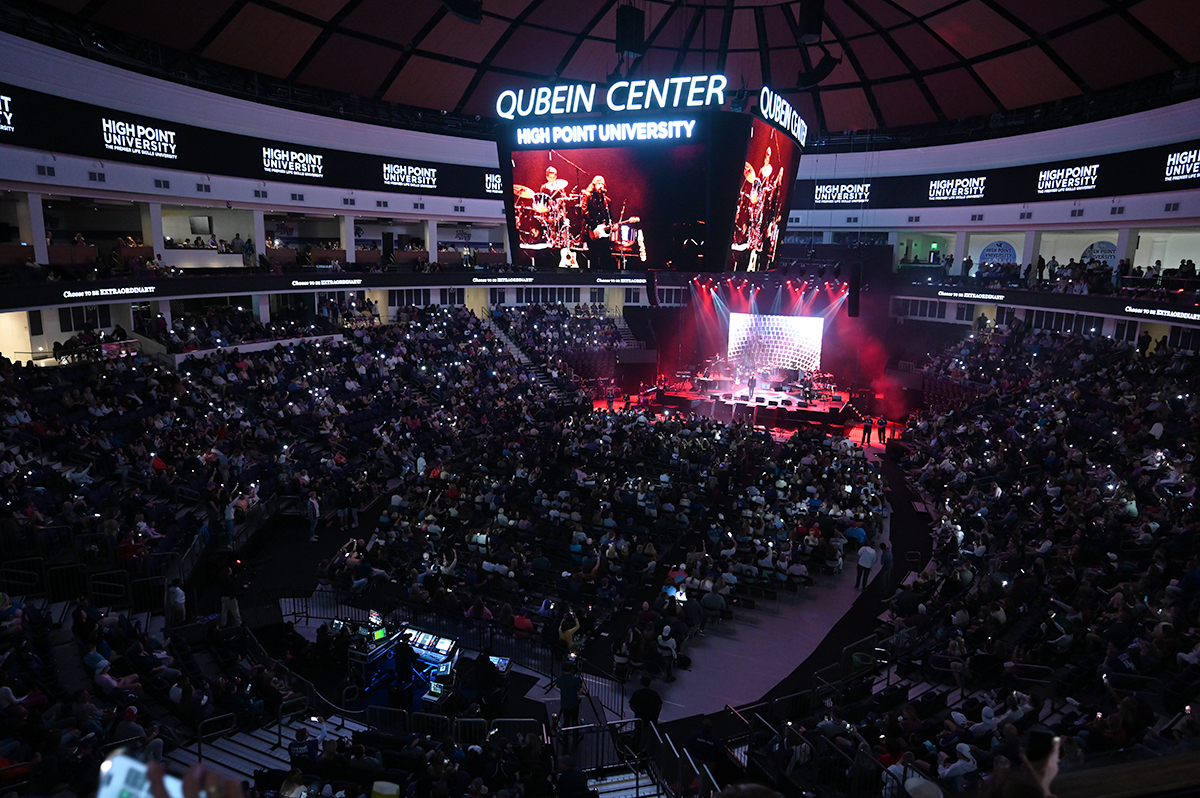 Students and family members enjoy tribute bands inside the Nido and Mariana Qubein Arena.