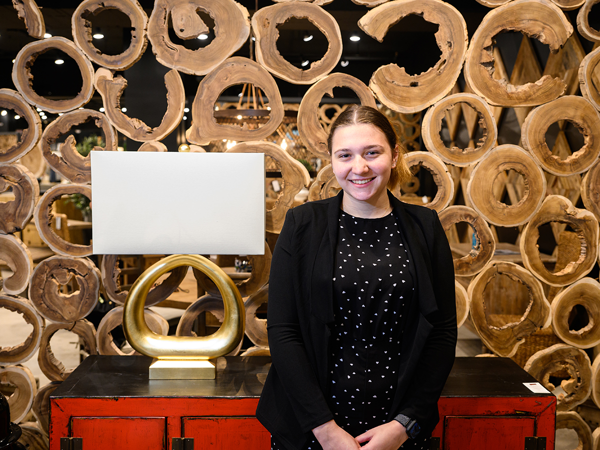 Brandi Harmon, a business administration major from Syracuse, New York, worked as a greeter in the Furniture Classics showroom.