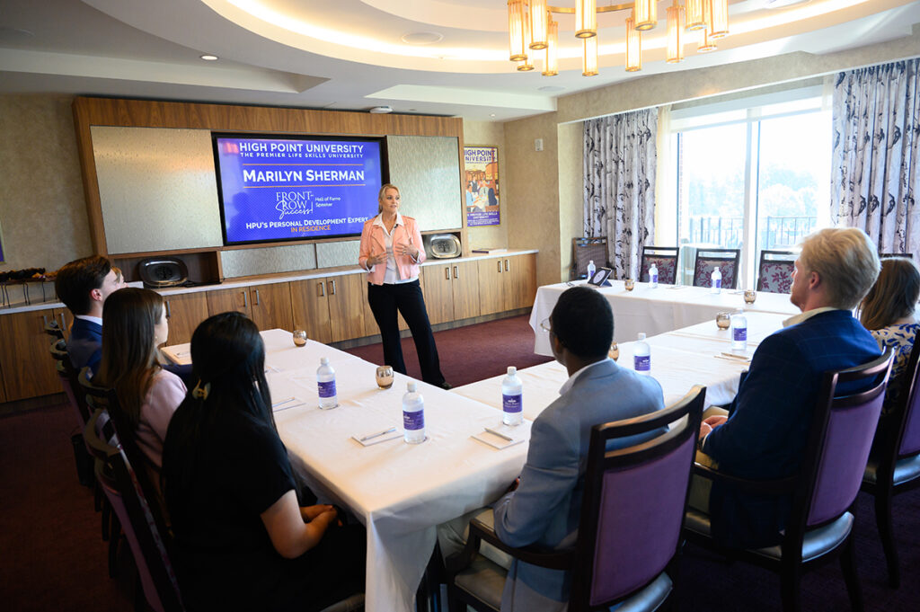 Sherman conducted career coaching sessions with small groups of students. 