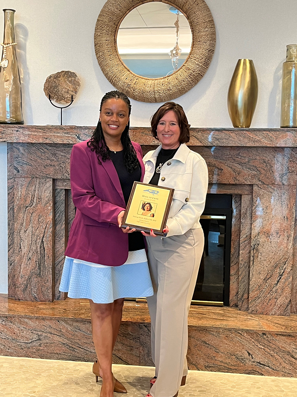 North Carolina Athletic Trainers’ Association President Nina Walker, left, inducted Dr. Nancy Groh, clinical education coordinator for HPU’s athletic training program and an assistant professor in athletic training, into the NCATA Hall of Fame on March 9 in Wrightsville Beach, North Carolina.