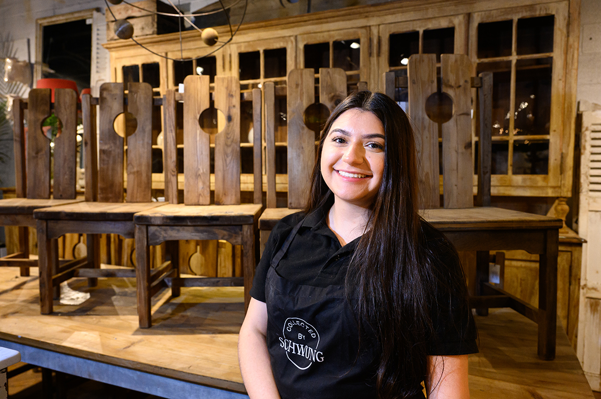 Julissa Perez-Ayala, a sophomore interior design major from Clayton, North Carolina, assisted customers in the Collected by Schwung showroom.