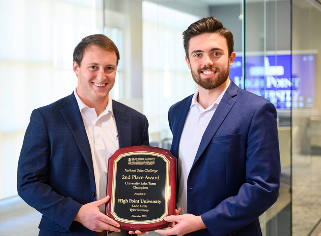 From left are Kade Little and Tyler Rumsey with the plaque they brought home after placing second overall in the 16th Annual National Sales Challenge (NSC) at William Paterson University in New Jersey. 