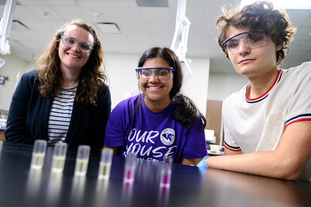 Dr. Kelsey Kean, assistant professor of biochemistry and co-director of SuRPS, in the lab with students Nadia Khan, center, and Parker Nyboer.