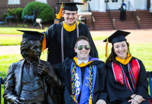 High Point University 2016 commencement ceremony graduates and faculty on lawn