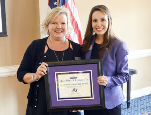 The photo features KJ Morgan (left), director of corporate sales and marketing at JH Adams Inn and recipient of the Experiential Learning Award, with Natalie Haire (right), community relations manager at HPU. 