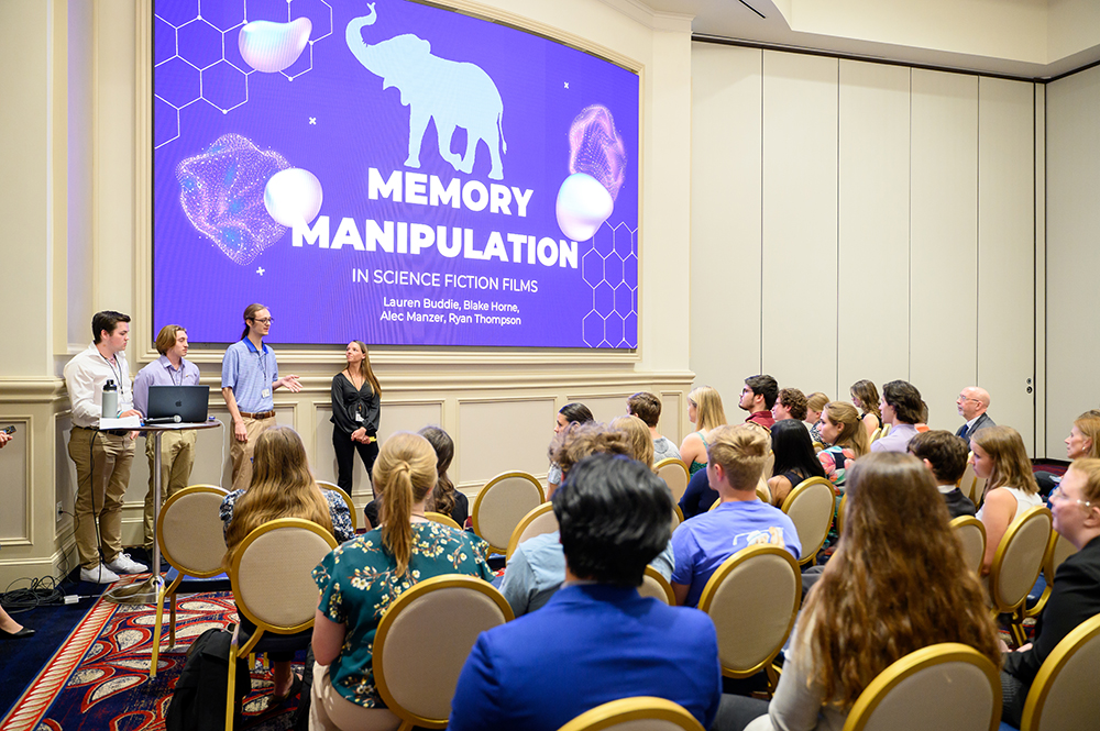 From left to right, junior Ryan Thompson, junior Alec Manzer, senior Blake Horne and junior Lauren Buddie presented their research project, titled Memory Manipulation, in one of many small breakout sessions. The first half of the event provided opportunities for breakout sessions like these, then concluded with a festival-style event where student presenters lined the concourse of the Qubein Center to share their research projects and posters with members of campus and the community.