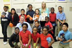 Cieri and Greg Stutts (second row, far left) from Walmart on North Main Street stand with the students after the event. 