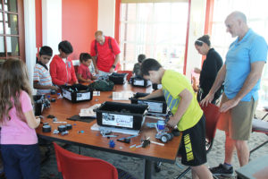 HPU students work with community members at the Lego Showcase event. 