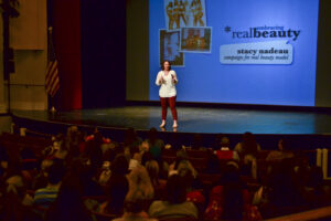 Stacy Nadeau addressing a crowd of more than 300 HPU students in Hayworth Fine Arts.