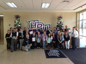 HPU Office of Student Life staff with the gifts they gave to the Family Services of the Piedmont. 