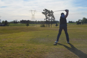 Hayden Bandy plays golf at the tournament.