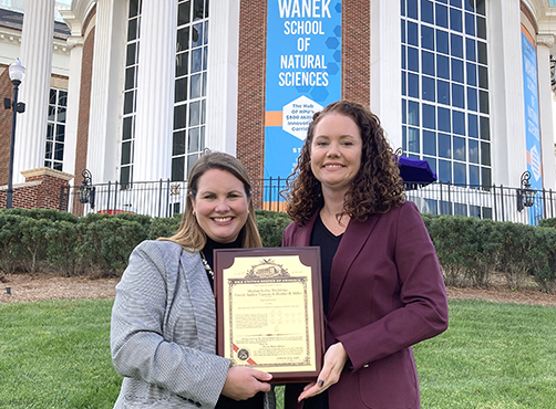 Drs. Meghan Blackledge and Heather Miller with their patent from their research--the first patent for High Point University