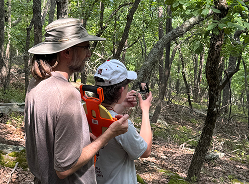 Biology student with Dr. Dane Kuppinger